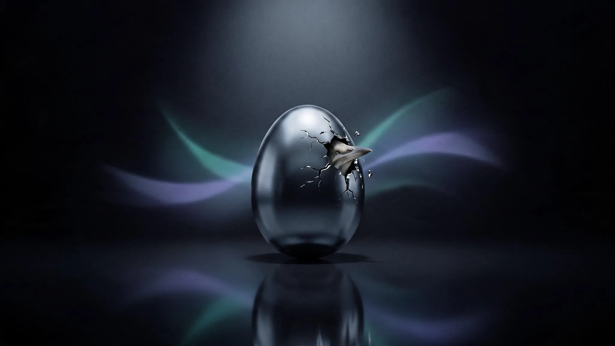 A chrome egg cracking open — something new is hatching